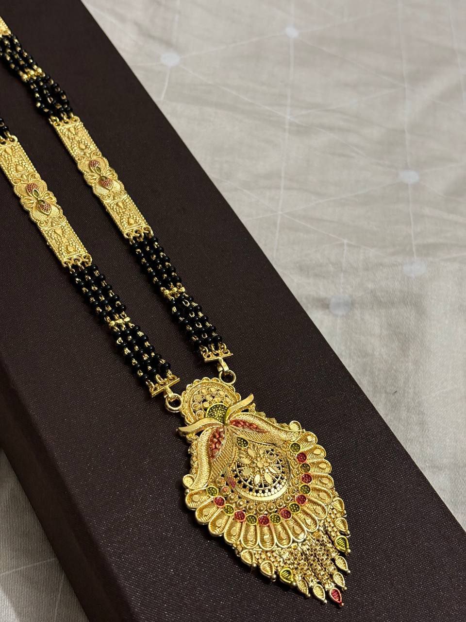 Traditional Long Gold Plated Designer Mangalsutra with Intricate Pendant for Women