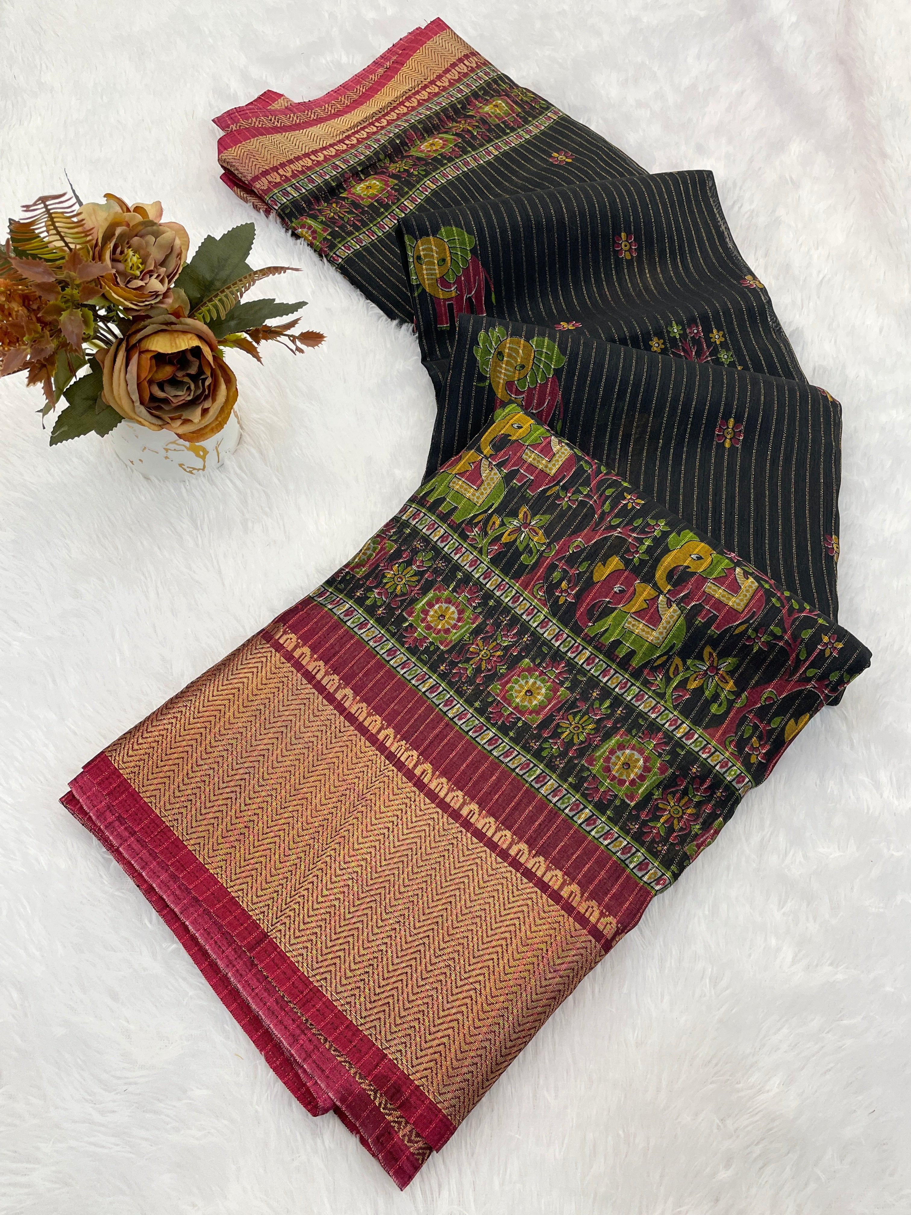 This designer saree is a perfect fusion of timeless elegance