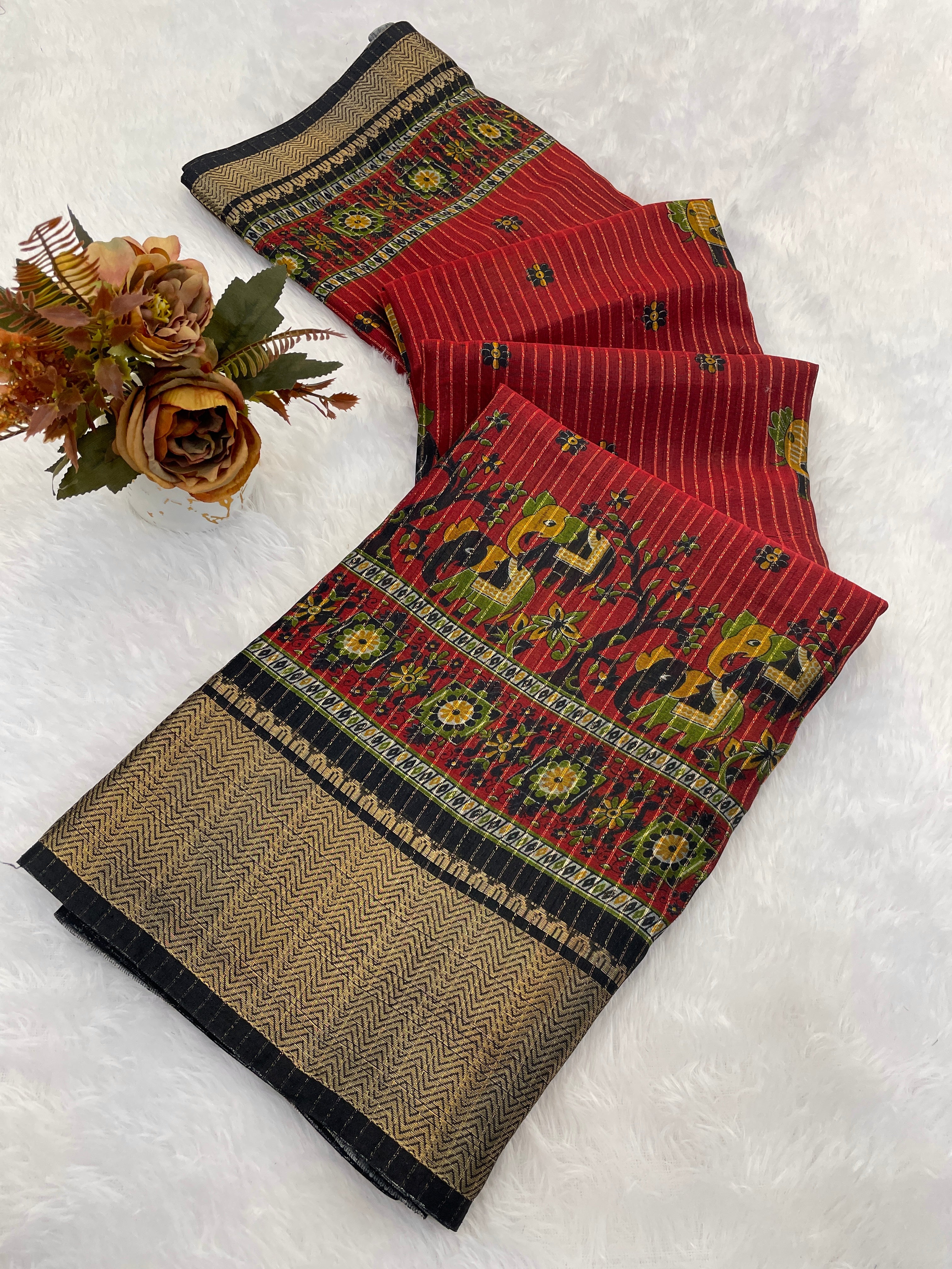 This designer saree is a perfect fusion of timeless elegance