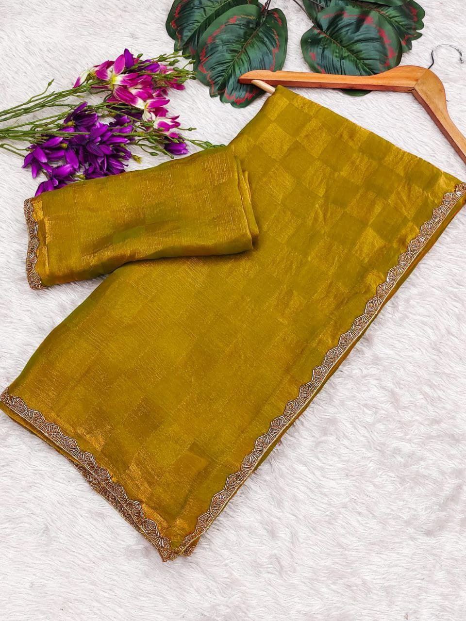 be an enthralling beauty of the evening by adorning this stunning sequined saree and blous