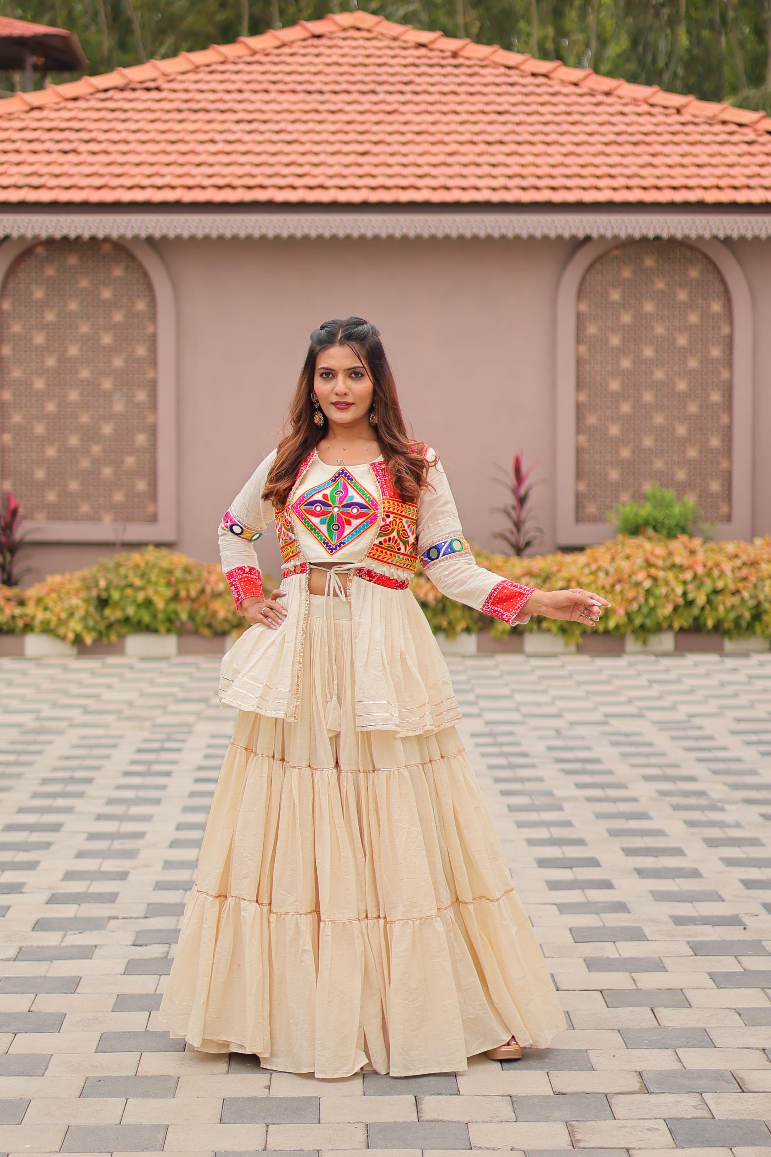 Beige Tiered Lehenga Set with Multicolor Embroidered Kutch Jacket