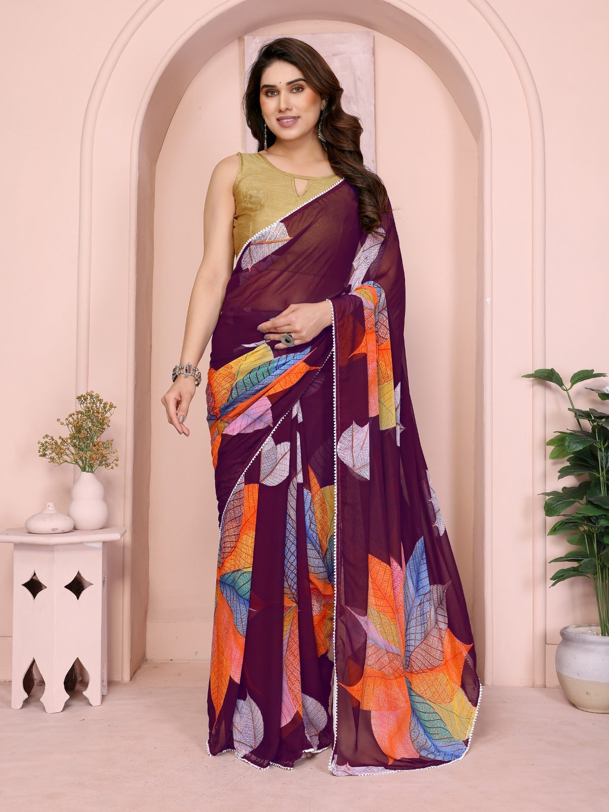 Elegant Maroon Georgette Saree with Multicolor Leaf Print & Golden Blouse