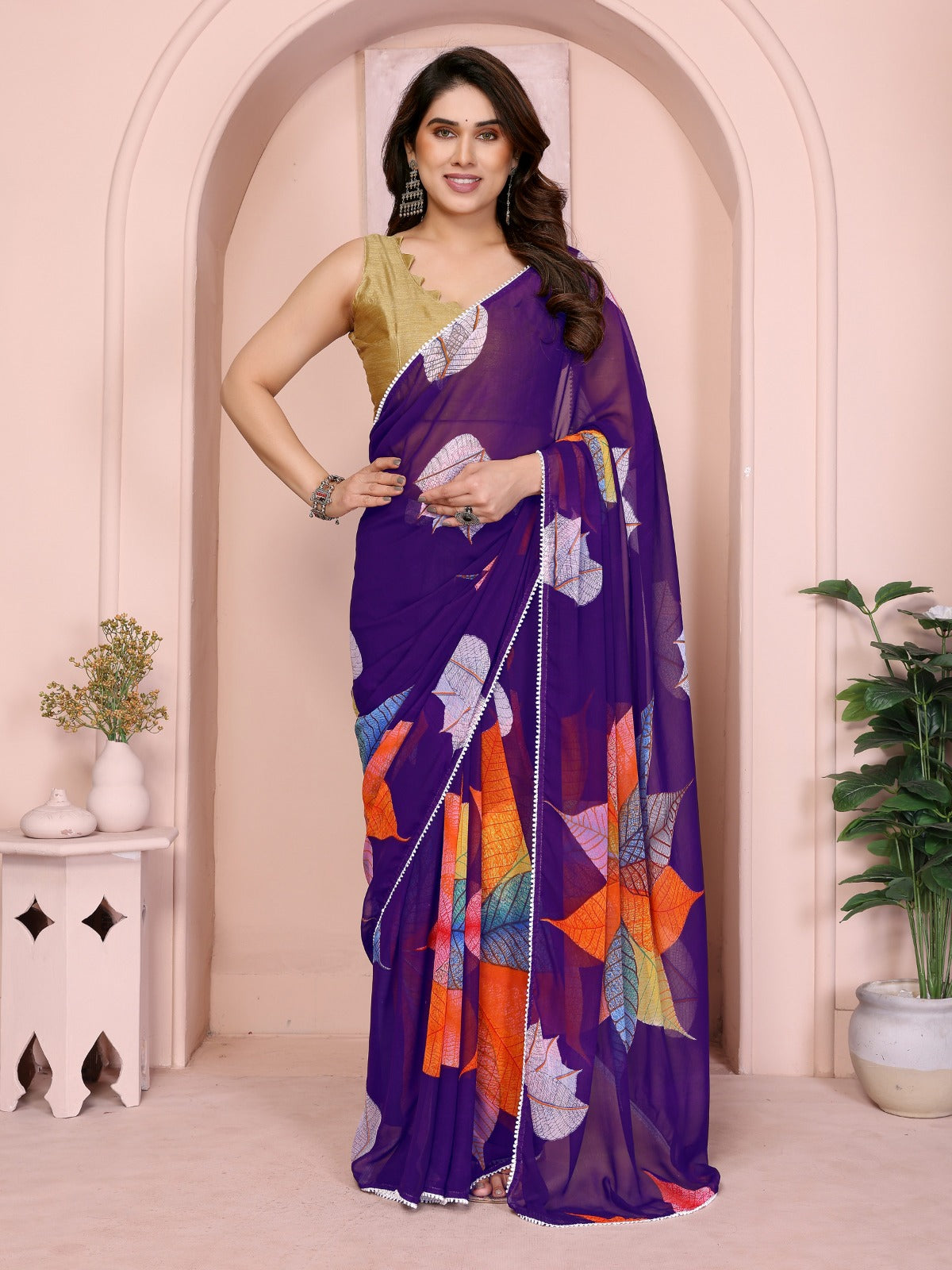 Elegant Maroon Georgette Saree with Multicolor Leaf Print & Golden Blouse