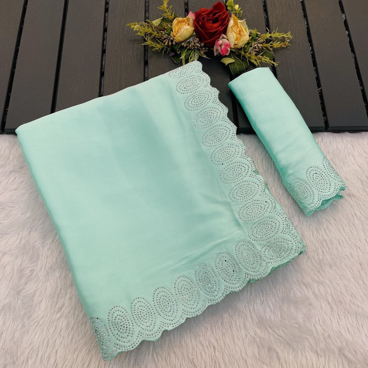 heavy satin designer saree adorned with a stunning hotfix diamond border & with jarkhan border saree