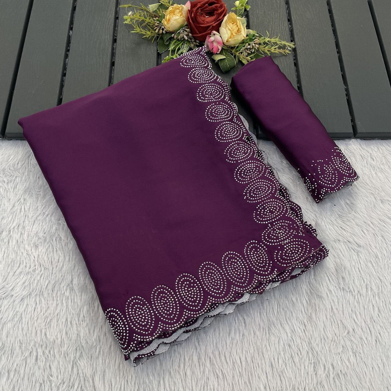 heavy satin designer saree adorned with a stunning hotfix diamond border & with jarkhan border saree