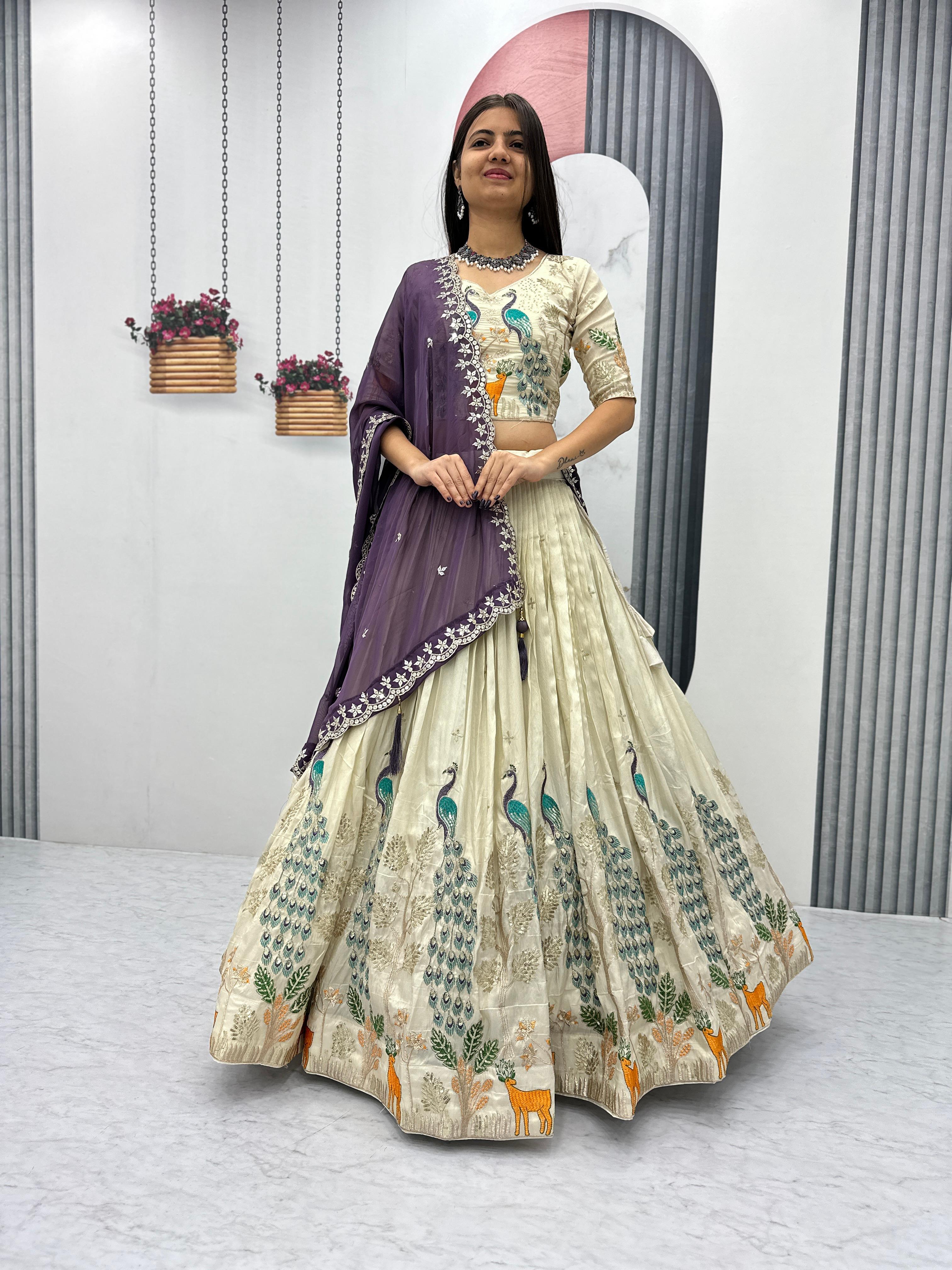 Elegant Cream Silk Lehenga with Nature-Inspired Embroidery and Purple Dupatta
