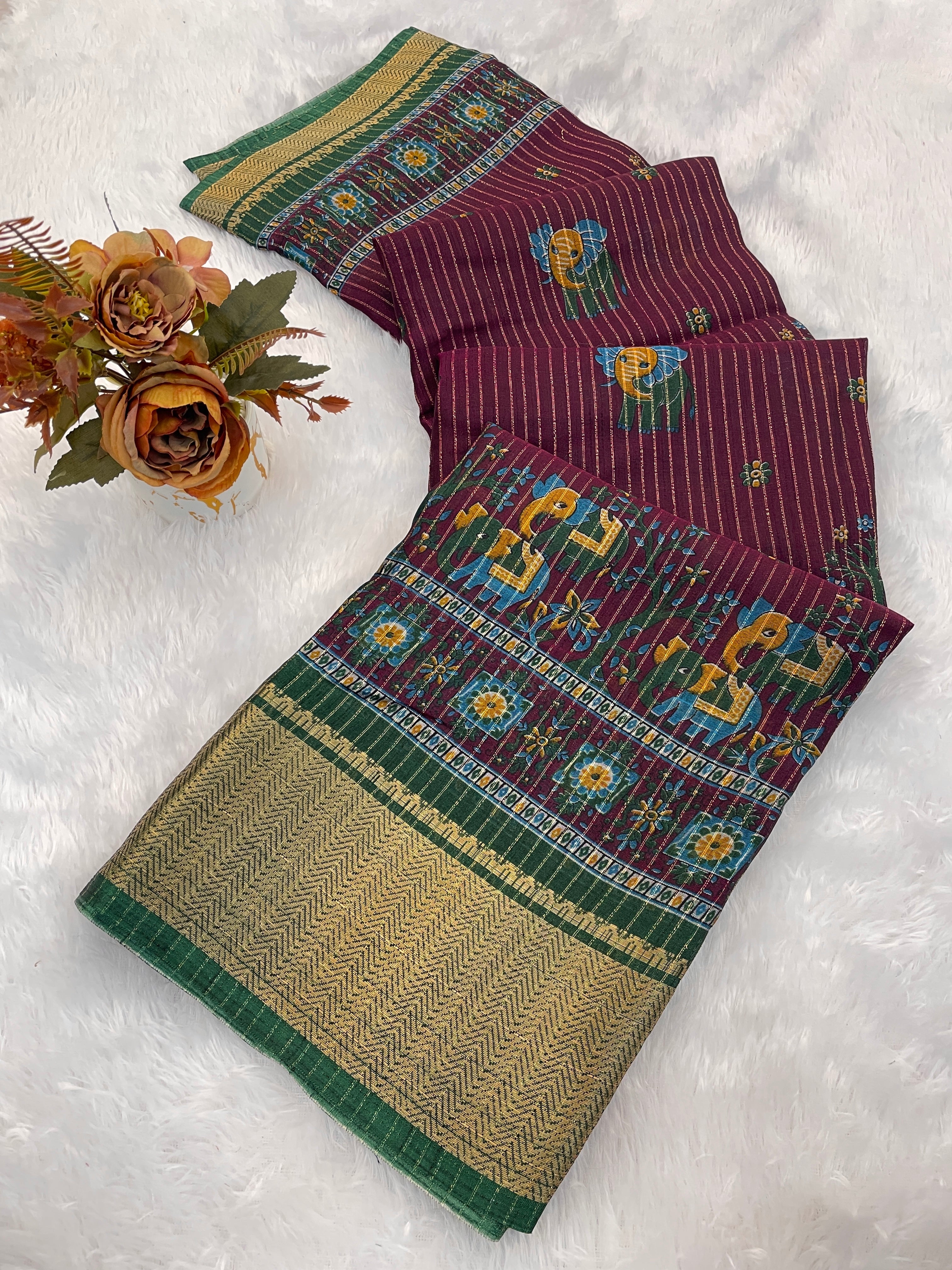 This designer saree is a perfect fusion of timeless elegance