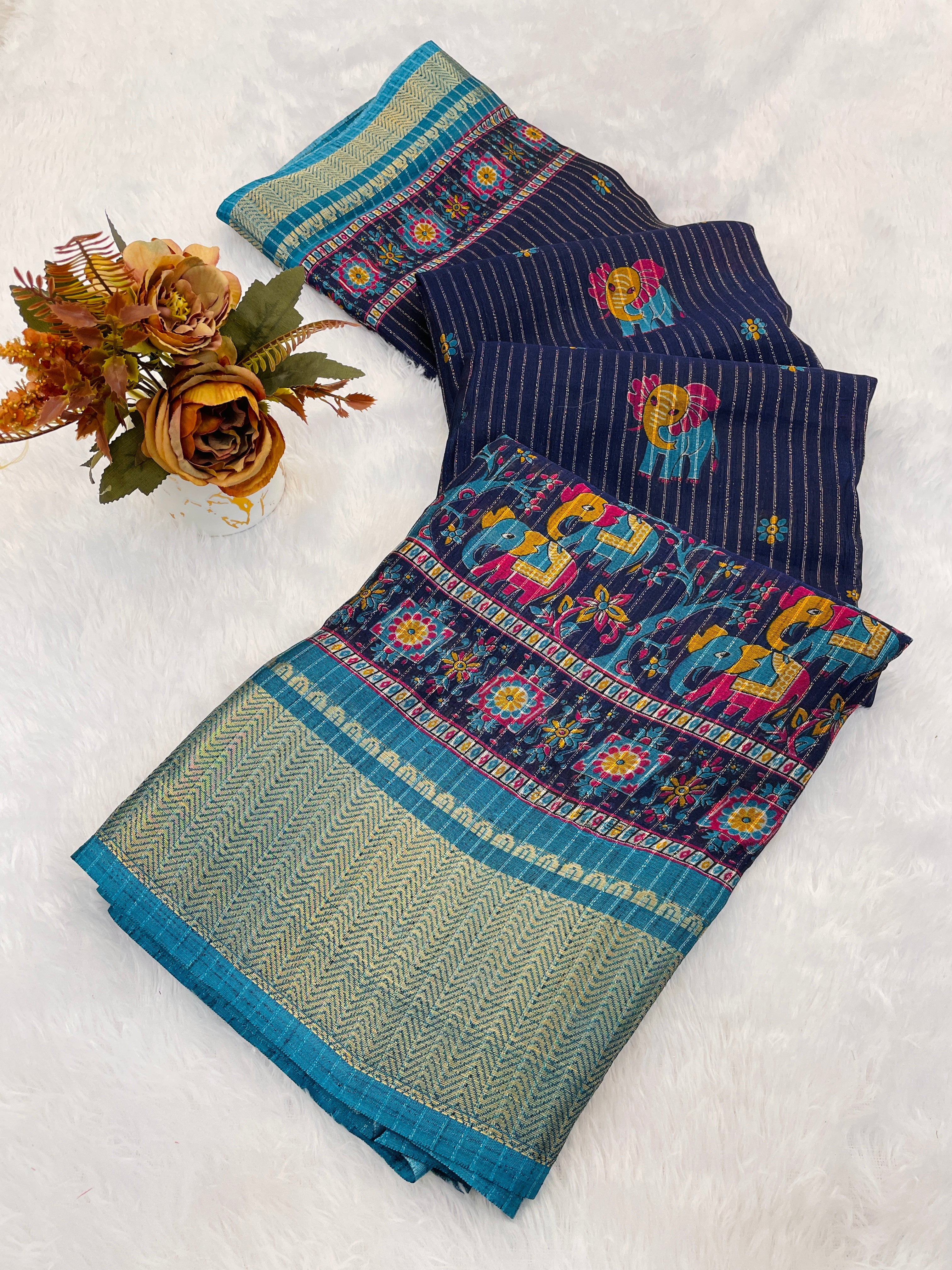 This designer saree is a perfect fusion of timeless elegance