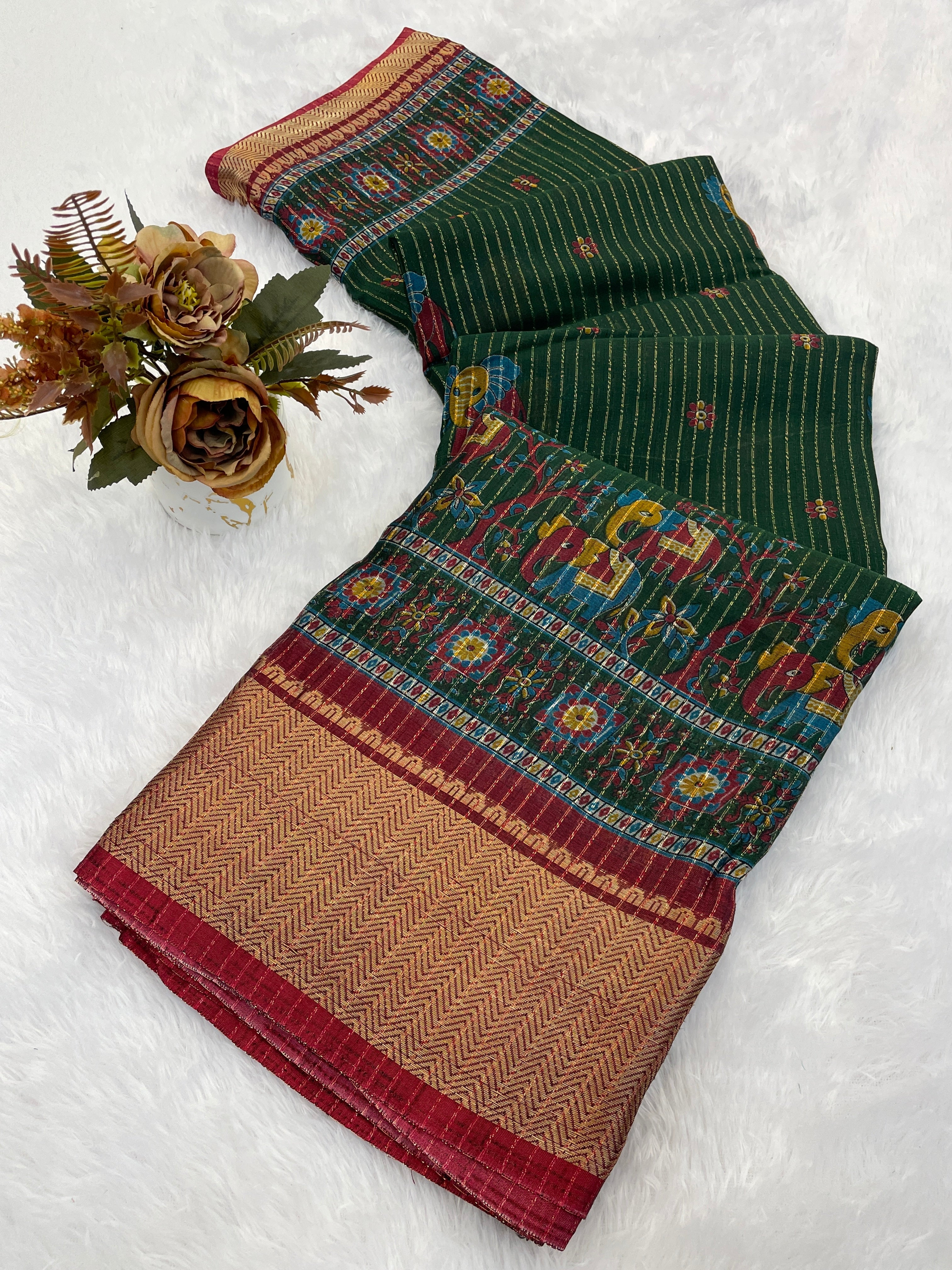 This designer saree is a perfect fusion of timeless elegance