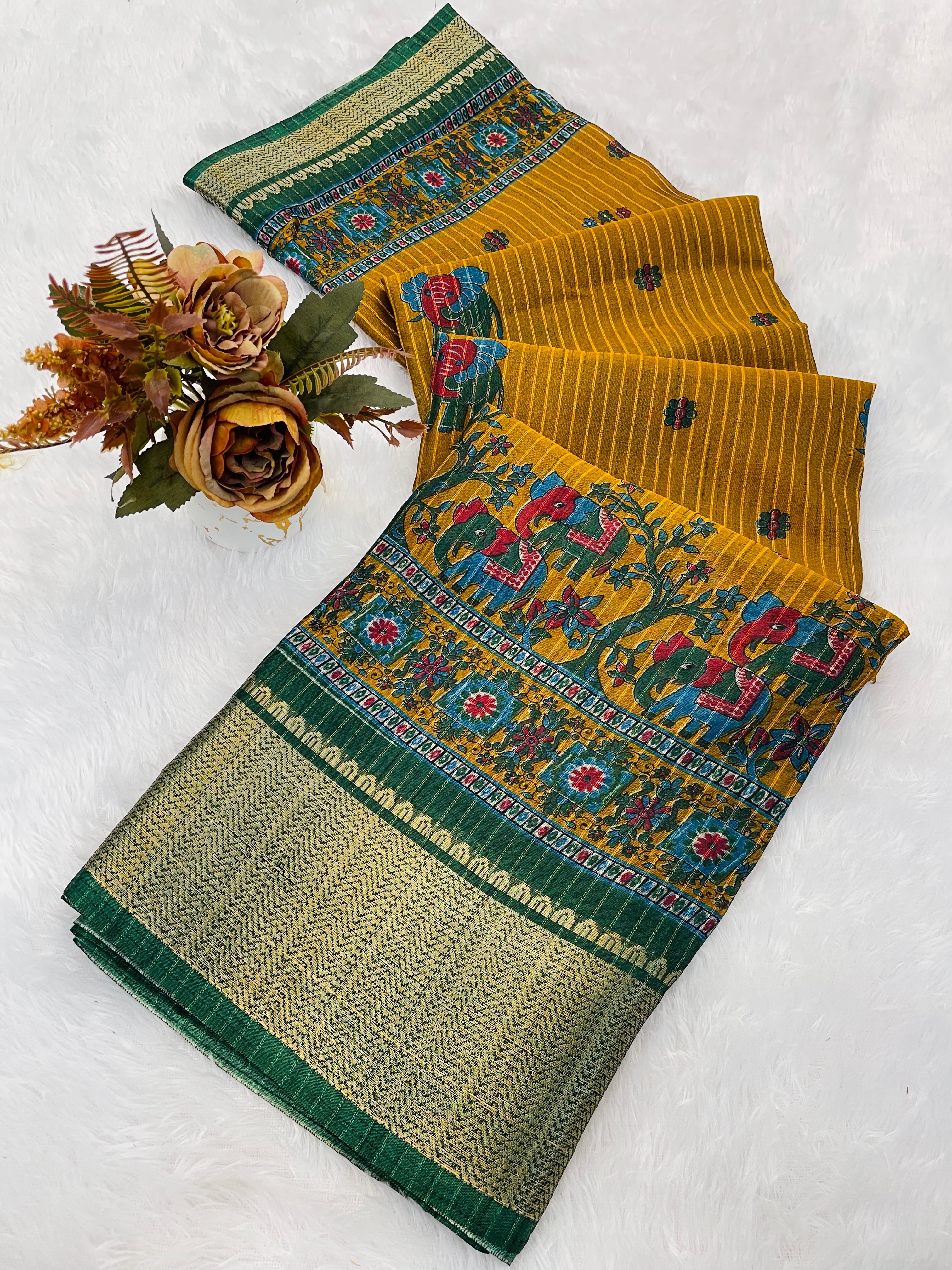 This designer saree is a perfect fusion of timeless elegance