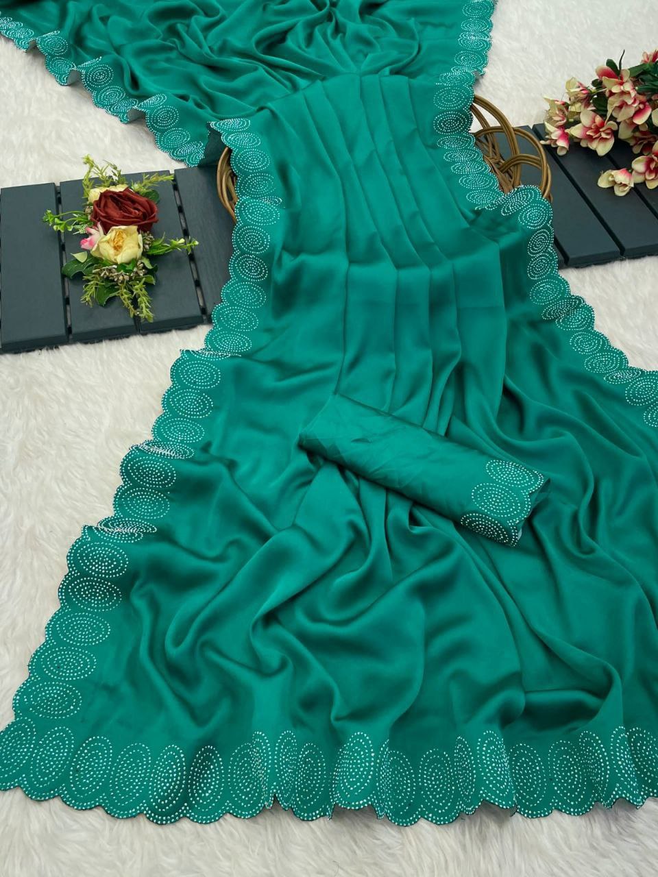 heavy satin designer saree adorned with a stunning hotfix diamond border & with jarkhan border saree