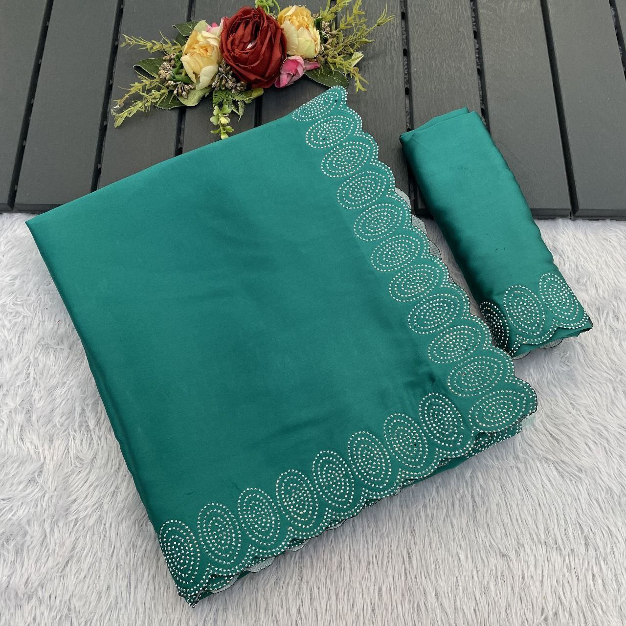 heavy satin designer saree adorned with a stunning hotfix diamond border & with jarkhan border saree