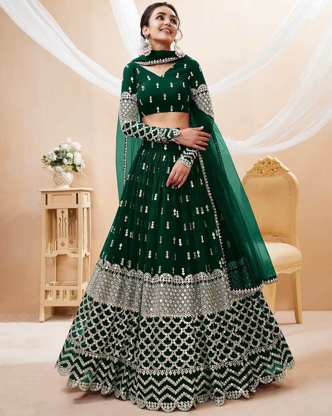 Emerald Green Embroidered Georgette Lehenga Choli with Mirror Work and Net Dupatta