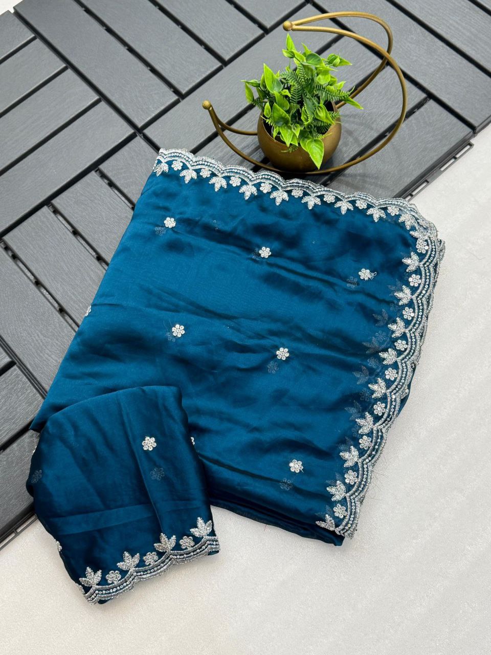 Pure blooming black rangoli Silk Fabric along with designer zari embroidery Saree