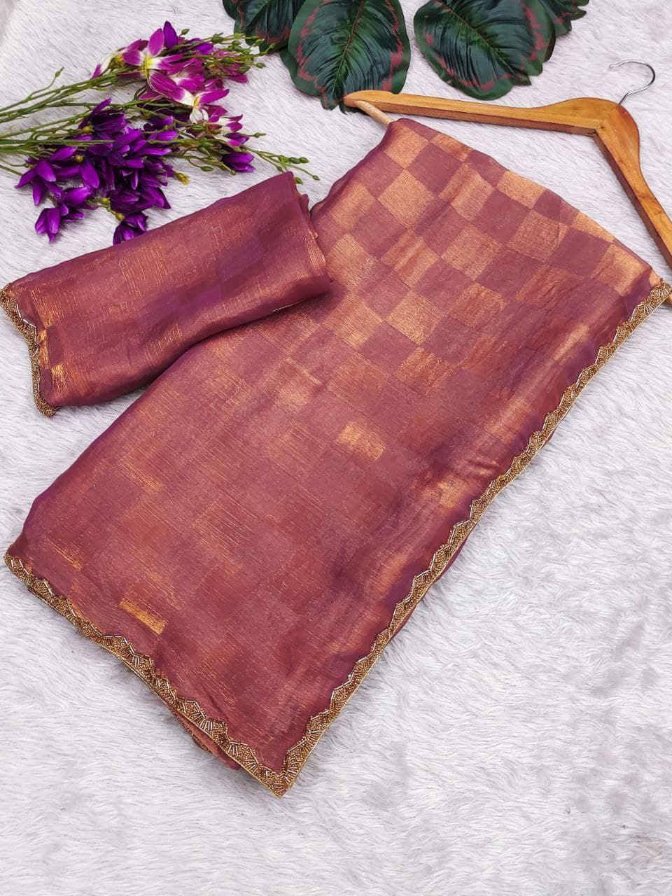 be an enthralling beauty of the evening by adorning this stunning sequined saree and blous